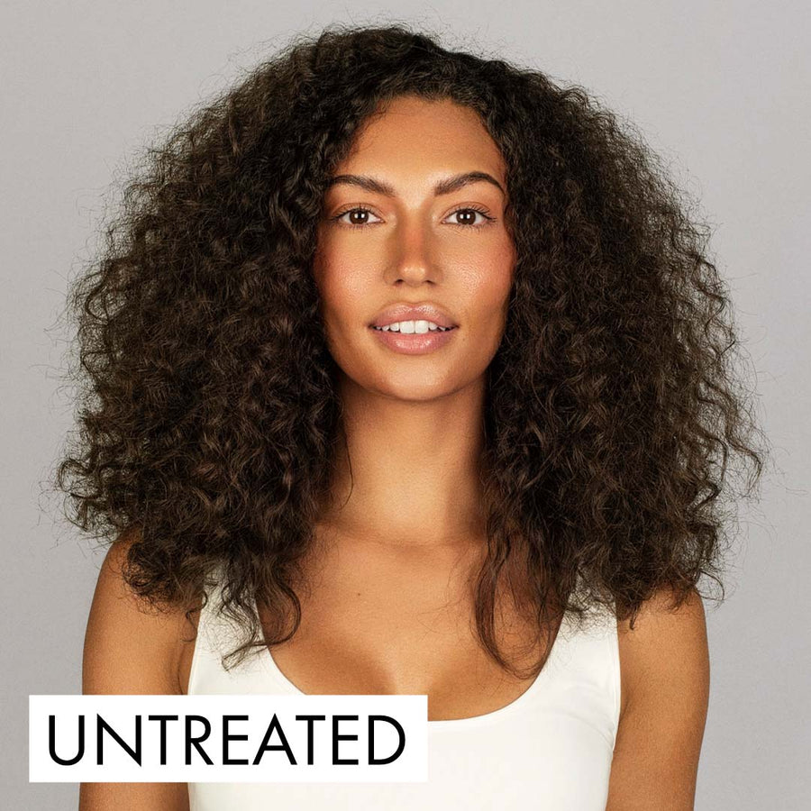 Photo of model with frizzy untreated hair